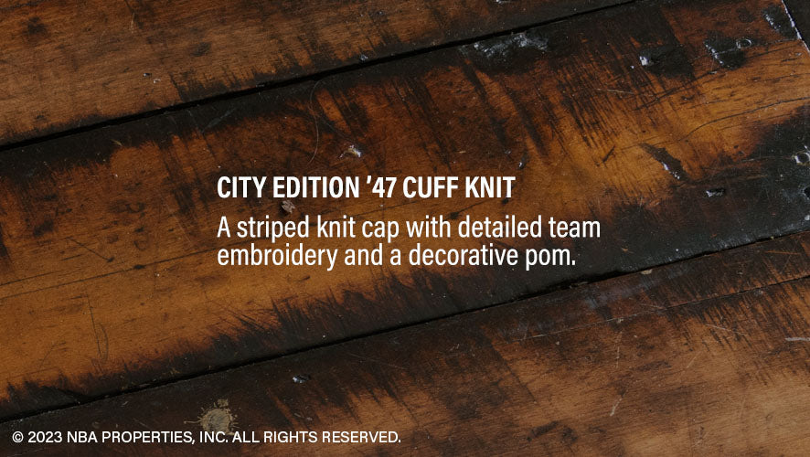 City Edition '47 Cuff Knit. A striped knit cap with detailed team embroidery and a decorative pom.