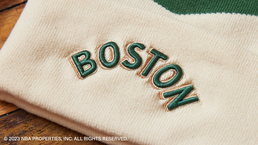 City Edition '47 Cuff Knit. A striped knit cap with detailed team embroidery and a decorative pom.