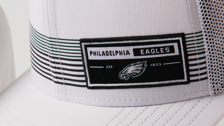 Detail image of front of white hat with team logo