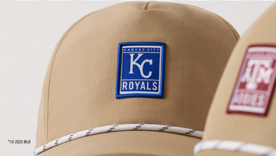 Beige cap with Kansas City Royals logo on a light gray background