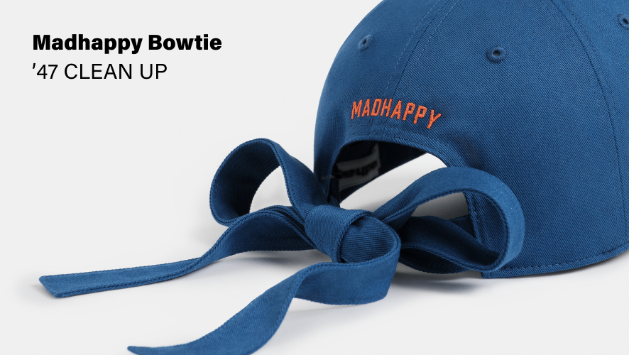 bowtie enclosure on a royal blue madhappy hat. Madhappy Bowtie-'47 CLEAN UP.