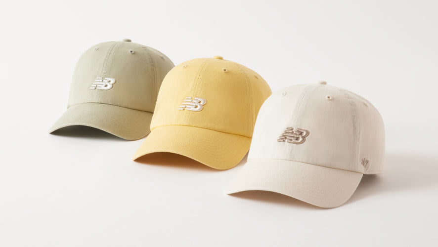 Three new balance clean up hats in green, yellow and cream.