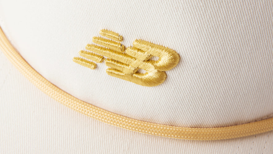 Yellow NB embroidery and rope detailing on hat