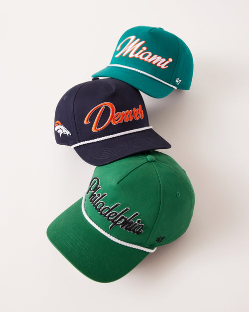 Three baseball caps with 'Miami', 'Denver', and 'Philadelphia' text on a white background