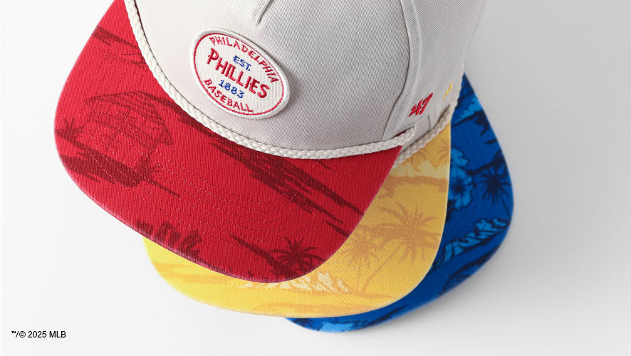three rope hats stacked with blue, yellow and red Fiji detailed brims.