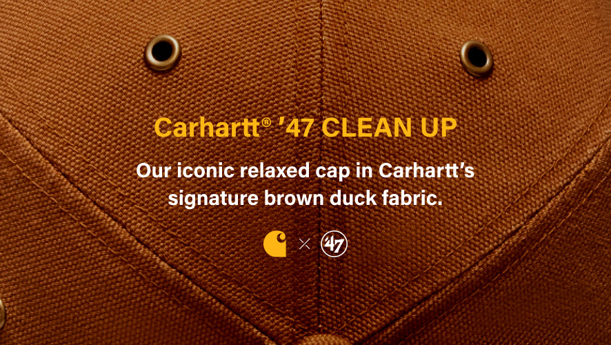 Carhartt '47 CLEAN UP. Our iconic relaxed cap in Carhartt's signature brown duck fabric. Detail of the top of a carhartt hat- carhartt and '47 logo