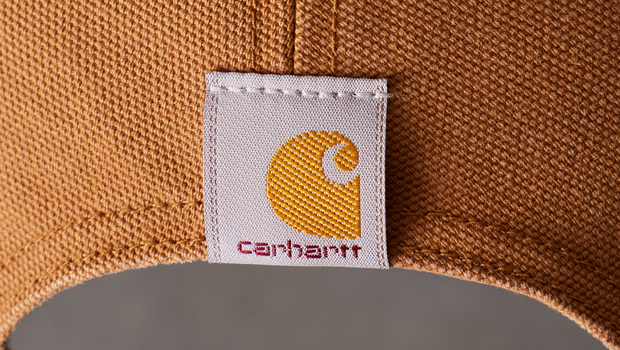 detail image of the back of a carhartt hat with carhartt logo