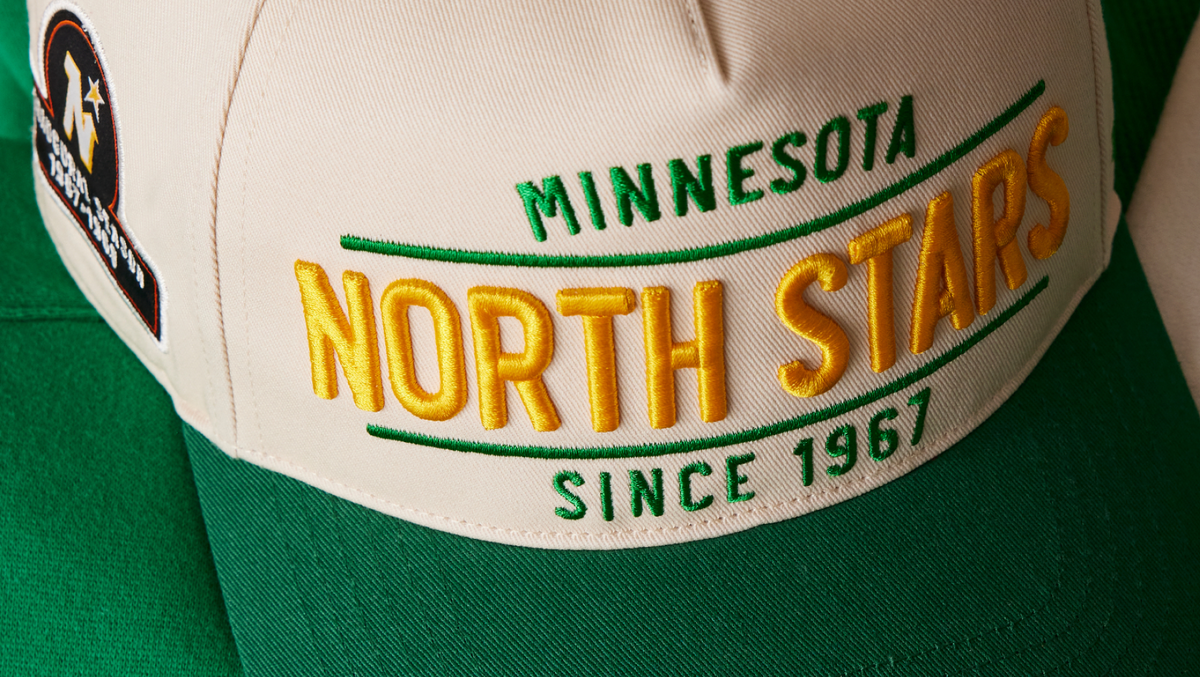 Cap with 'Minnesota North Stars' text and logo.