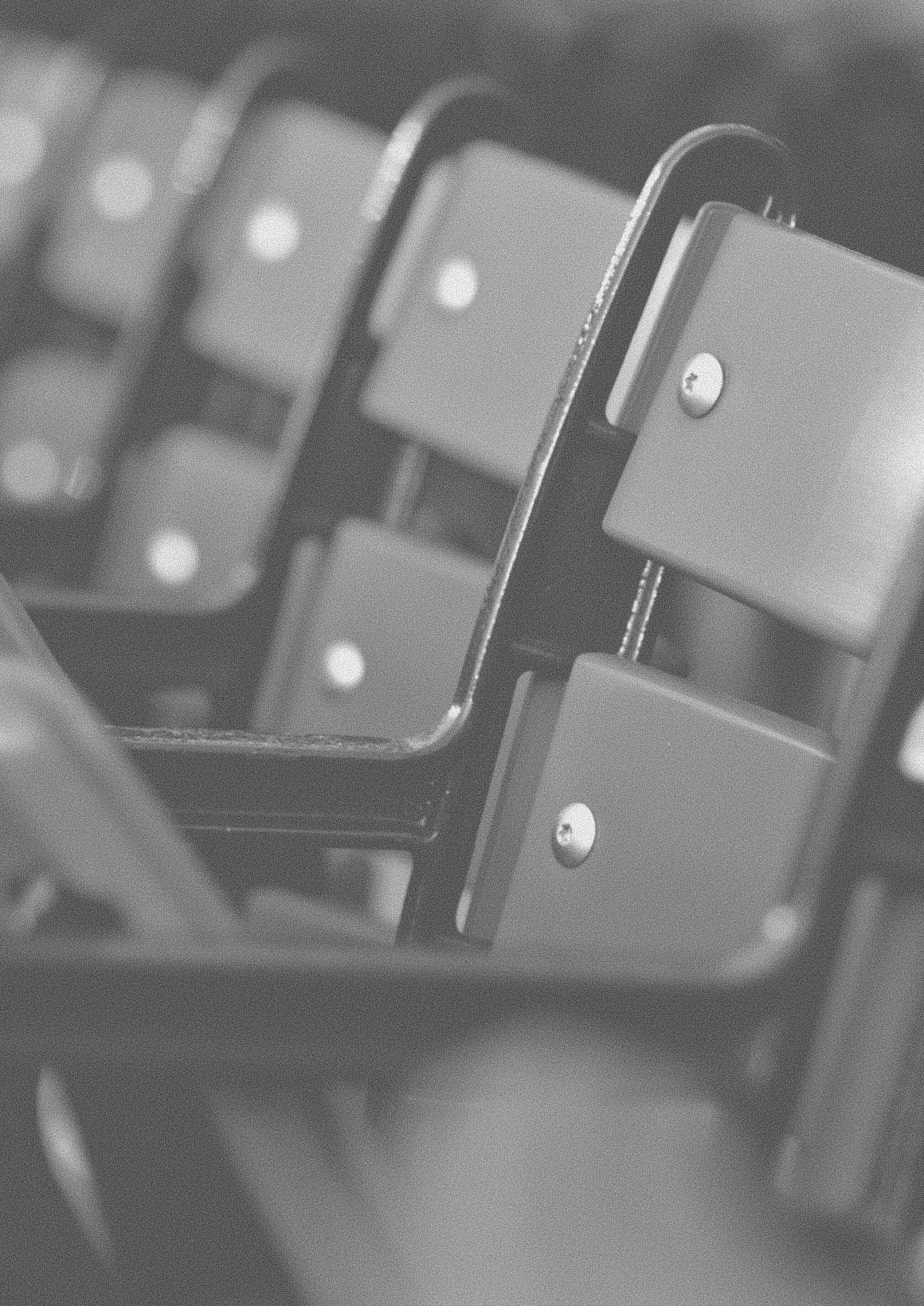 Close-up of stadium seating with a blurred background