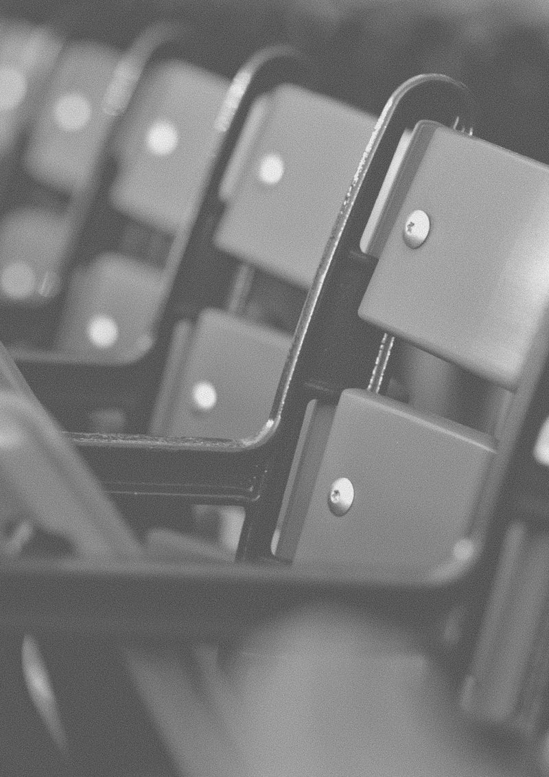 Close-up of stadium seating with a blurred background