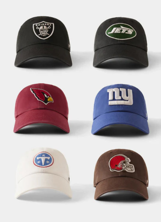 Six baseball caps with different team logos on a white background