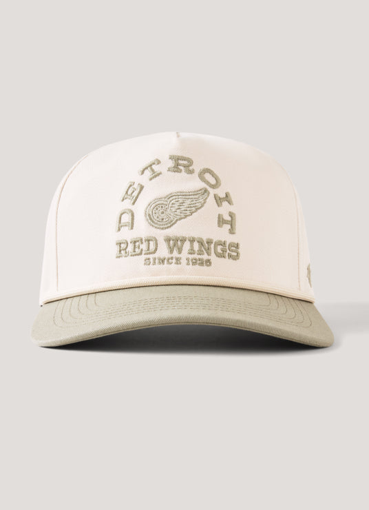 White cap with 'Detroit Red Wings' text and logo on a gray background