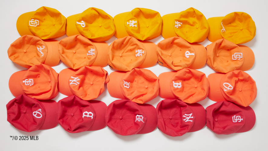 Collection of baseball caps in orange, yellow, and red with logos on a white background