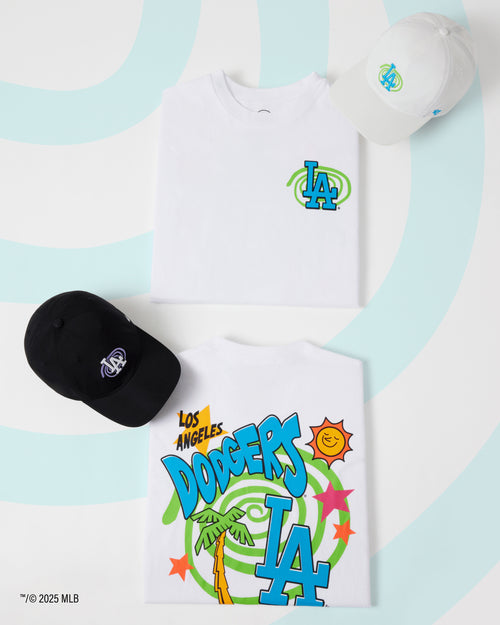 Los Angeles Dodgers t-shirt with two caps on a light blue background