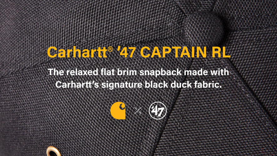 Carhartt '47 Captain RL cap with text and brand logos on black fabric background. THE RELAXED FLAT BRIM SNAPBACK MADE WITH CARHARTTS SIGNATURE BLACK DUCK FABRIC