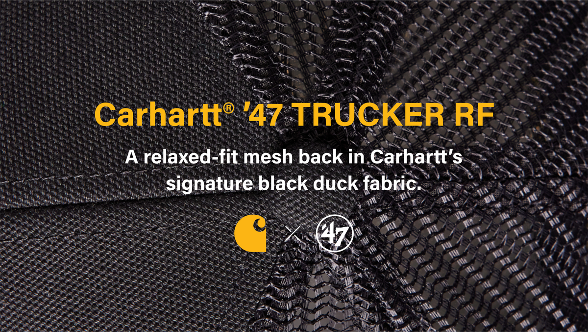 Carhartt '47 Trucker RF cap with black duck fabric texture and brand logos.