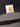 Close-up of a Carhartt label on a dark fabric background