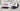 two hats next to each other (left white and black hat and right navy and blue hat)