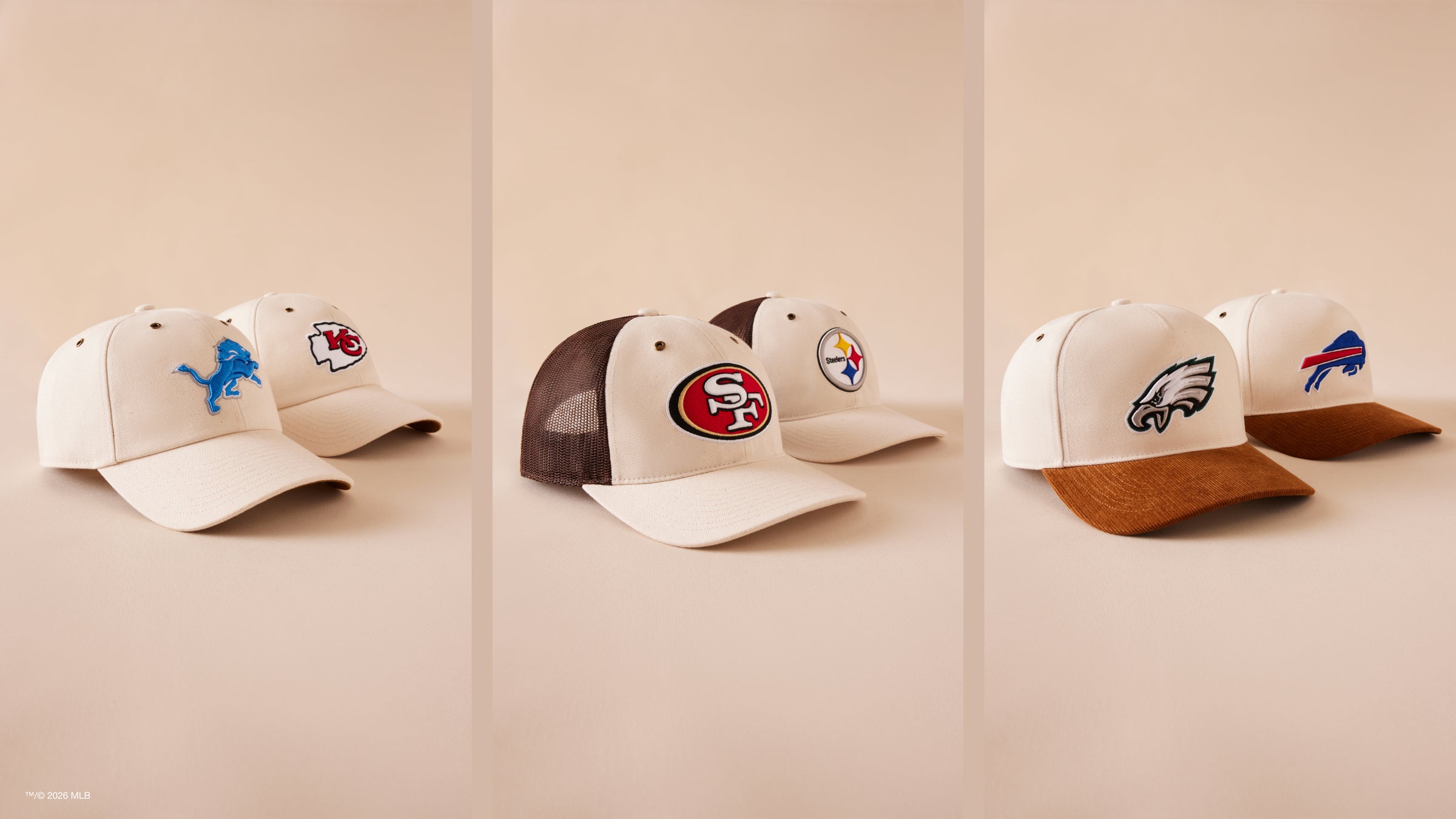 Three baseball caps with different team logos on a beige background
