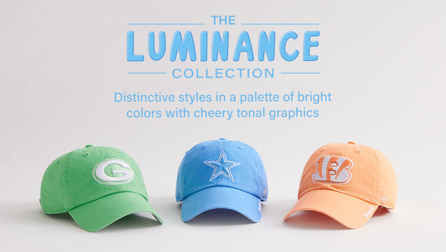 Three pastel-toned NFL hats in green, blue, and orange with tonal team logos from the Packers, Cowboys, and Bengals.