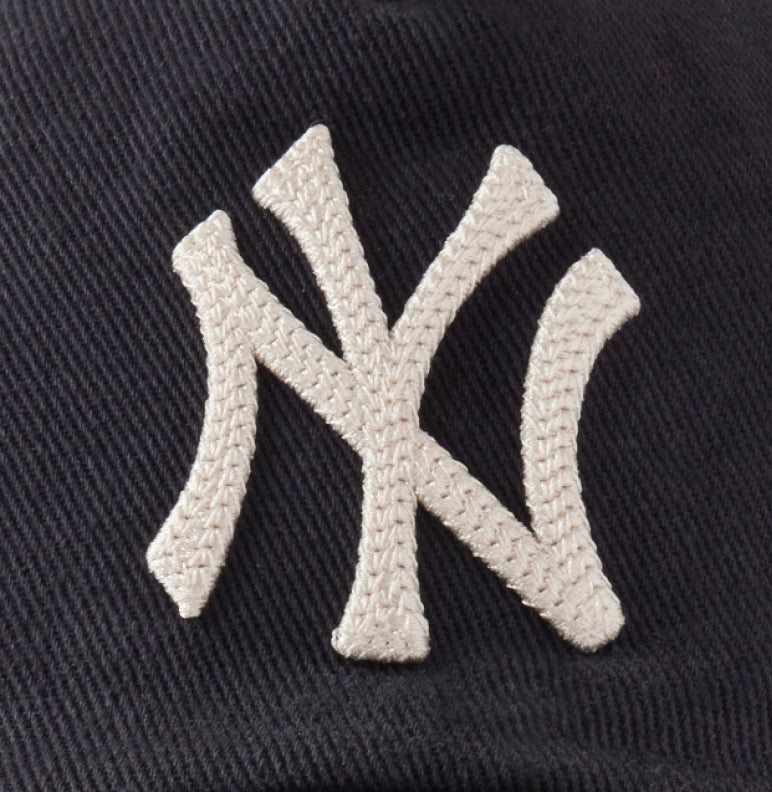 Close-up of a New York Yankees logo on a dark background