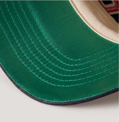 Close-up of a green textured product on a light gray background