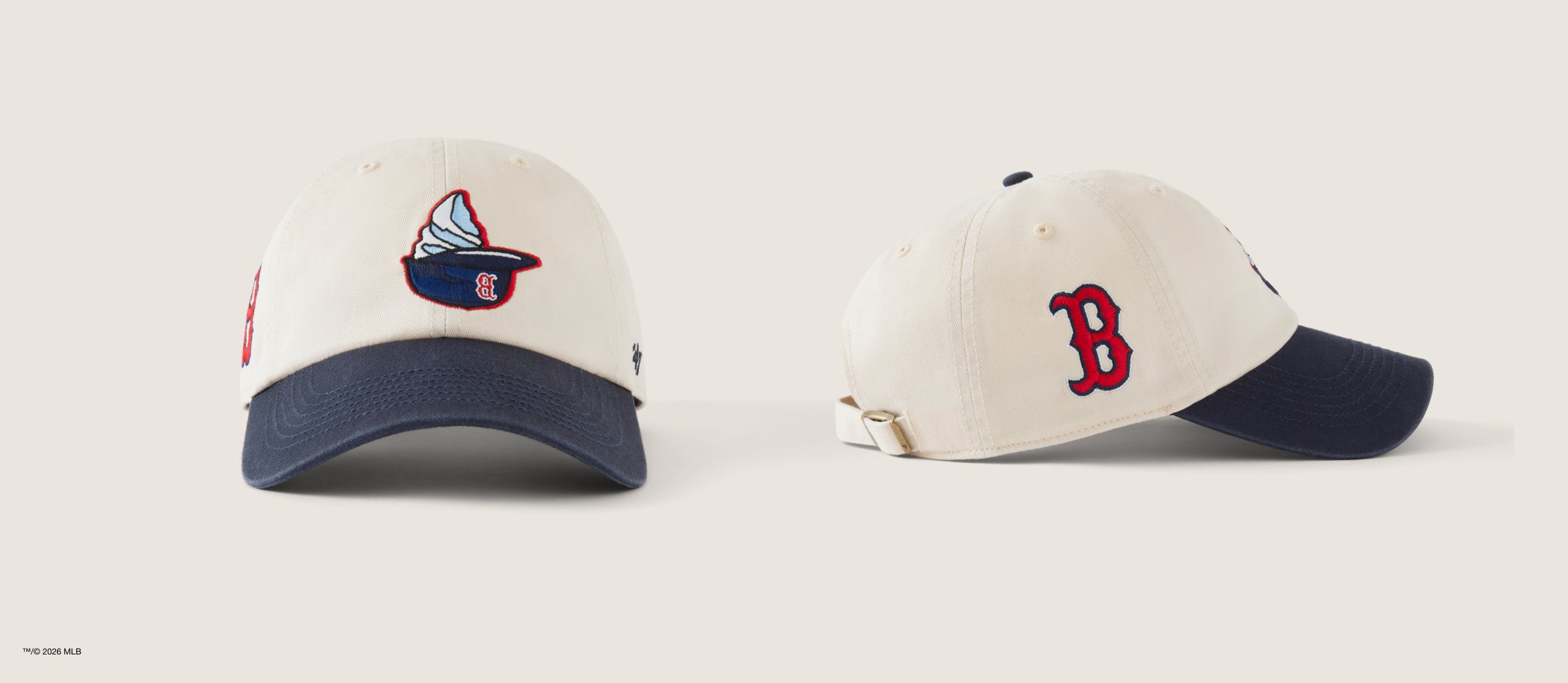 Two baseball caps with team logos on a light background