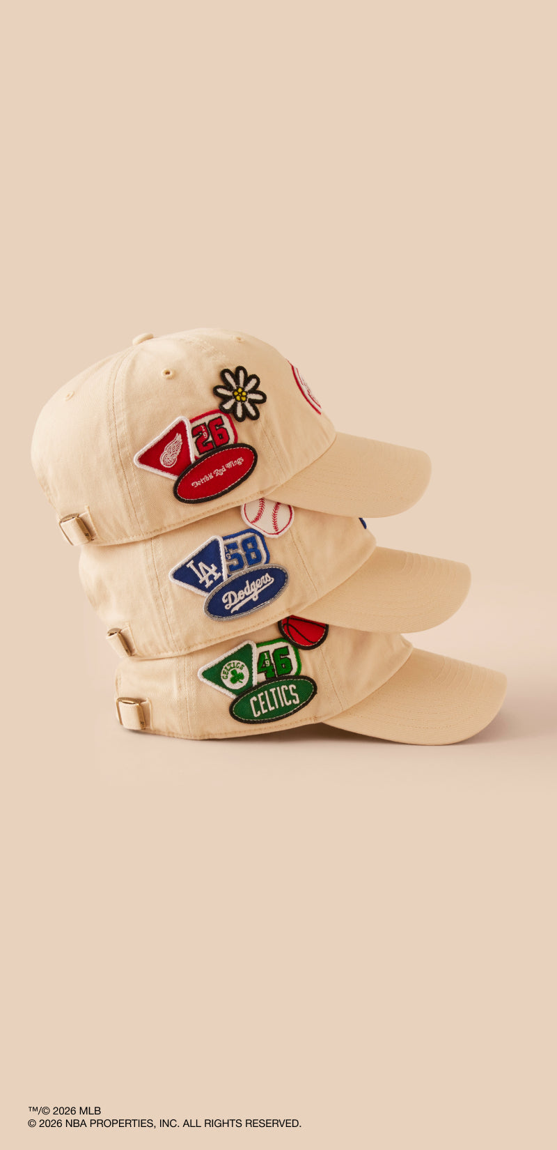 Beige cap with embroidered logos on a beige background